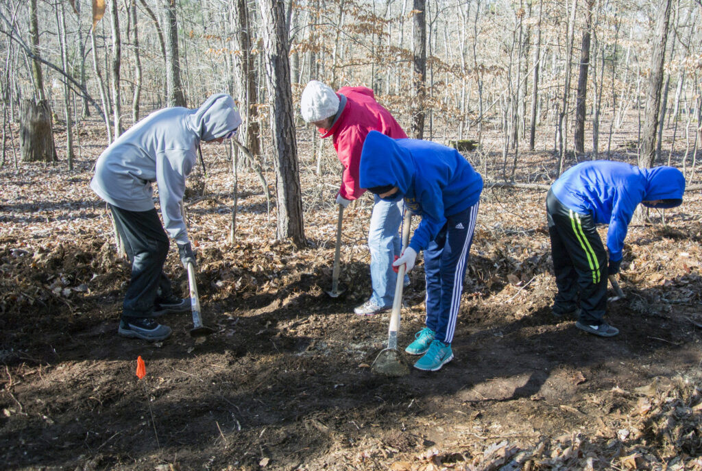 Building trails by hand is hard work, but with a little instruction, anyone can do it!