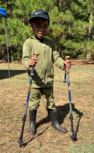 Oct23 Boy with trekking poles WildIdeas BrumleyS scaled 2