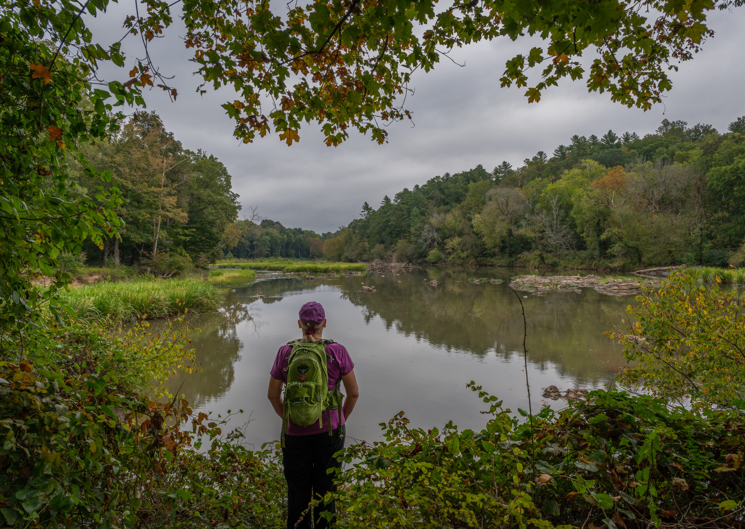 September23 Female hiker looking at river confluence White Pines 1 1 scaled